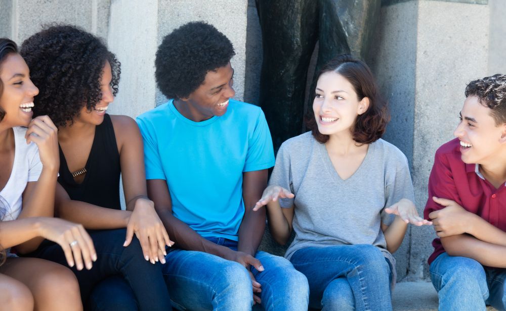 Group of young adults socializing together